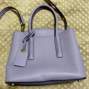 Kate Spade handbag. Used 1-2 times. Excellent condition. Color is lavender